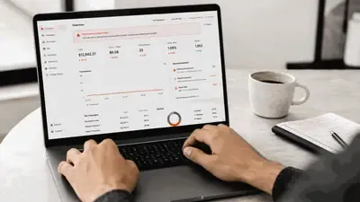 Roofer reviewing marketing results on a laptop
